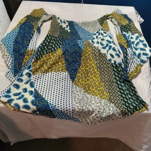 Smocked off the should tunic